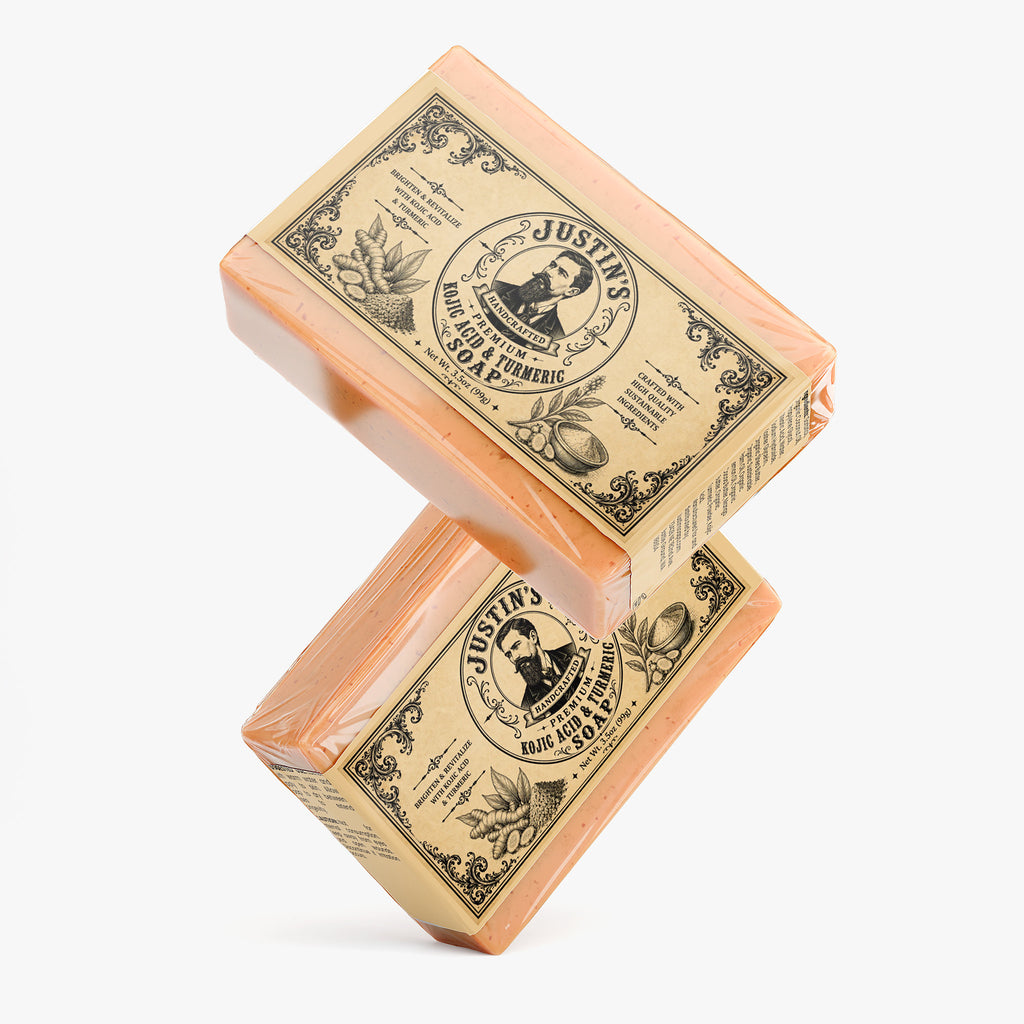 Stacked bars of Justin's Handcrafted Kojic Acid & Turmeric Soap.